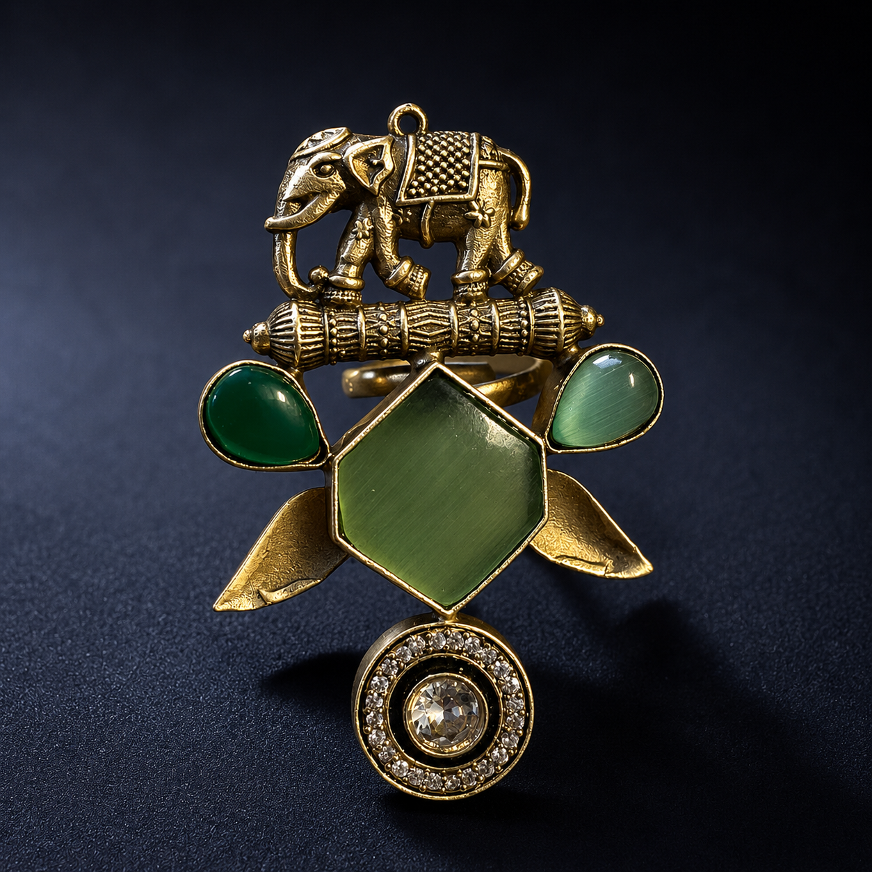 Elephant Motif Tribal Statement Ring with Green Stones