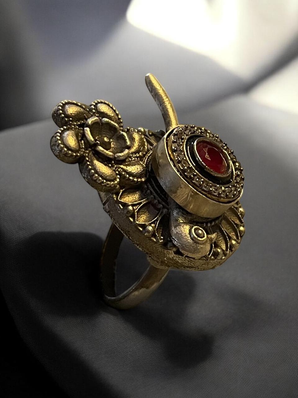 Floral and Bird Motif Oxidised Ring with Red Stone Accent