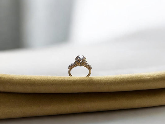 Gold-Tone Solitaire Ring with Side Stone Detailing