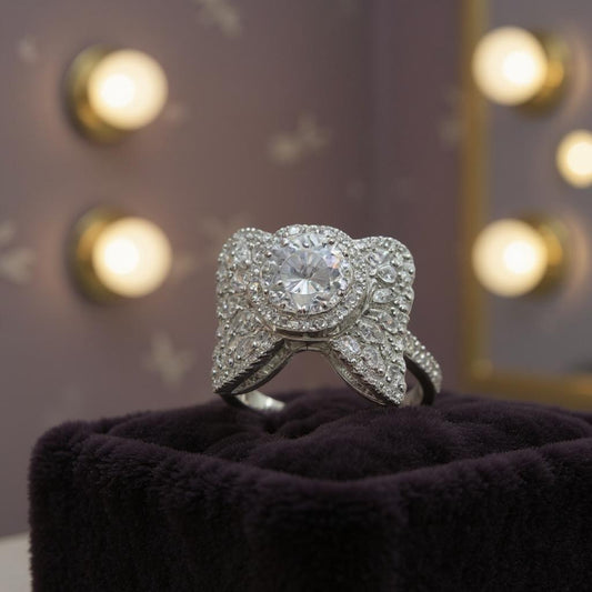 Silver Bow Design Ring with Central Solitaire Stone