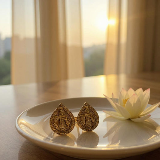 Teardrop Krishna Flute Stud Earrings in Antique Gold Finish