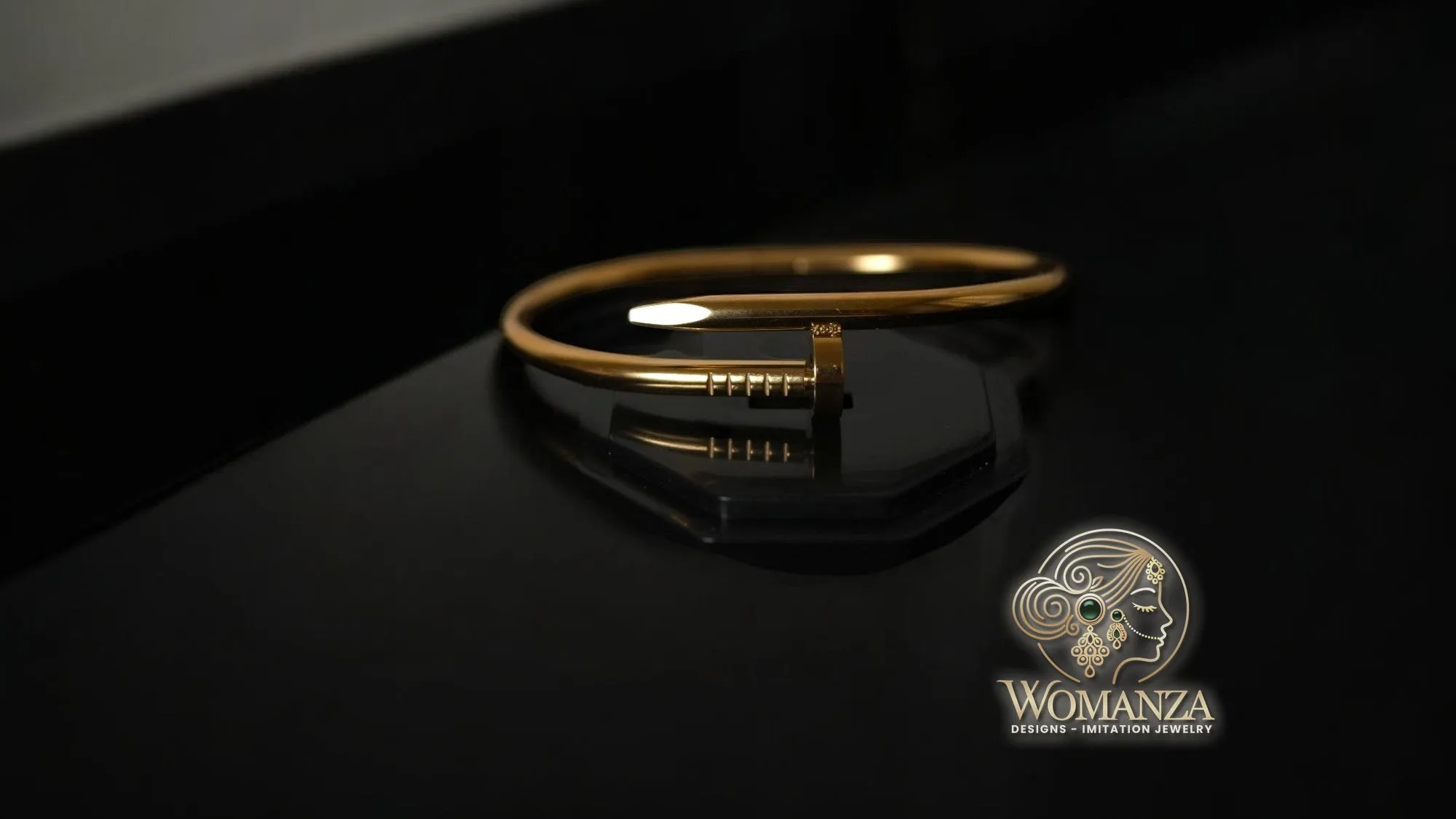Edgy Chic Nail-Inspired Gold Bracelet