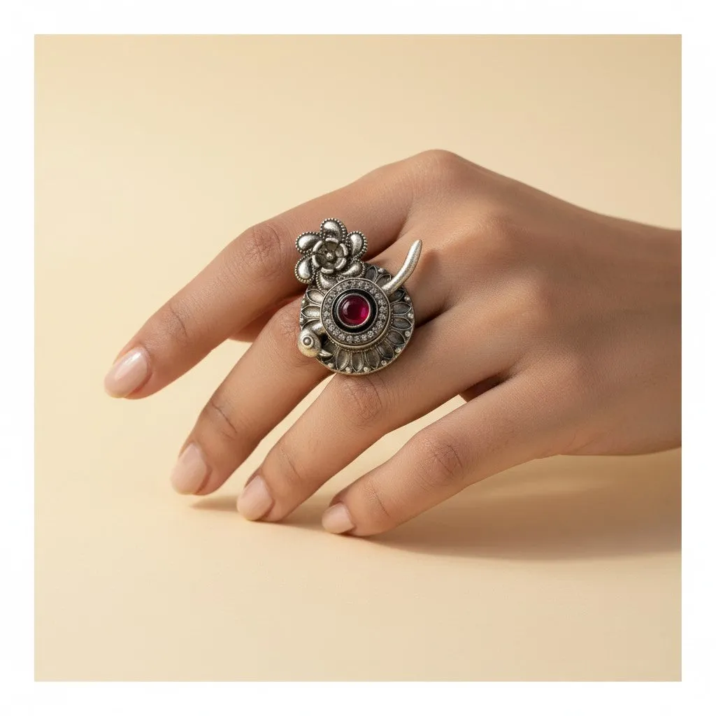 Floral & Bird Motif Oxidised Ring with Red Stone Accent