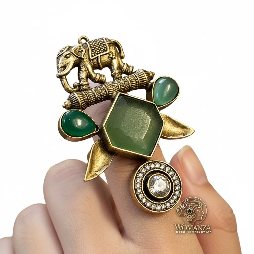 Elephant Motif Tribal Statement Ring with Green Stones