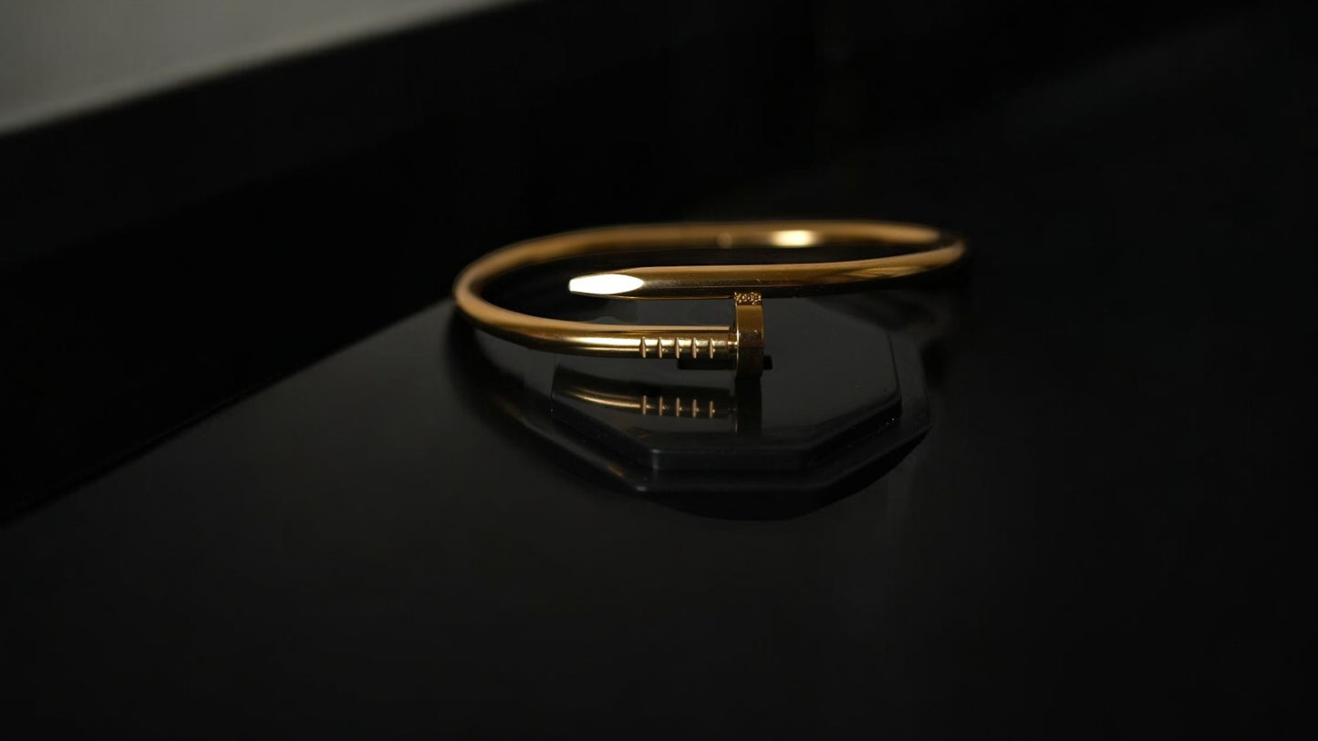 Edgy Chic Nail-Inspired Gold Bracelet