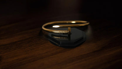Edgy Chic Nail-Inspired Gold Bracelet