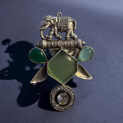 Elephant Motif Tribal Statement Ring with Green Stones