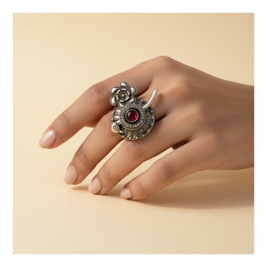 Floral & Bird Motif Oxidised Ring with Red Stone Accent