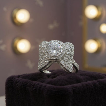 Silver Bow Design Ring with Central Solitaire Stone